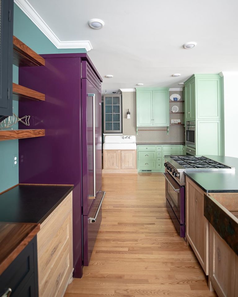Eclectic kitchen with plum and mint painted cabinetry