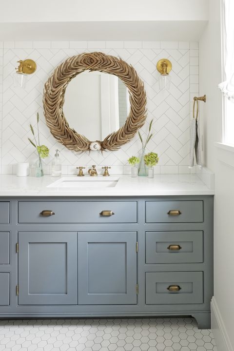 Slate blue custom bath vanity with brass hardware